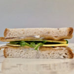 deli sandwich cut in half seen in elevation