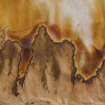 abstract splotches that ripple across the paper, almost like flames or steep mountains